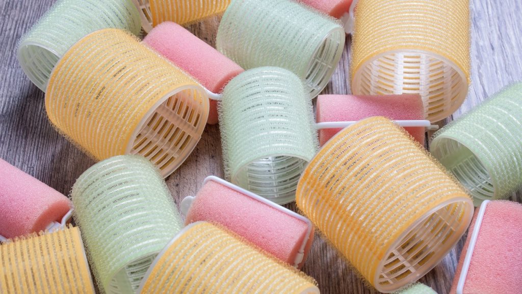 use Velcro curlers to clean pet hair from your car